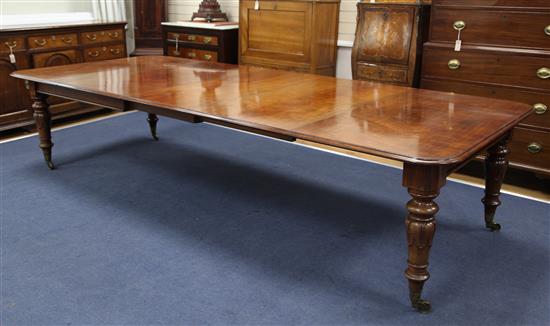 Johnstone & Jeanes. A handsome early Victorian mahogany extending dining table, Extended to 12ft 6in. x 4ft 6in. H.2ft 6in.